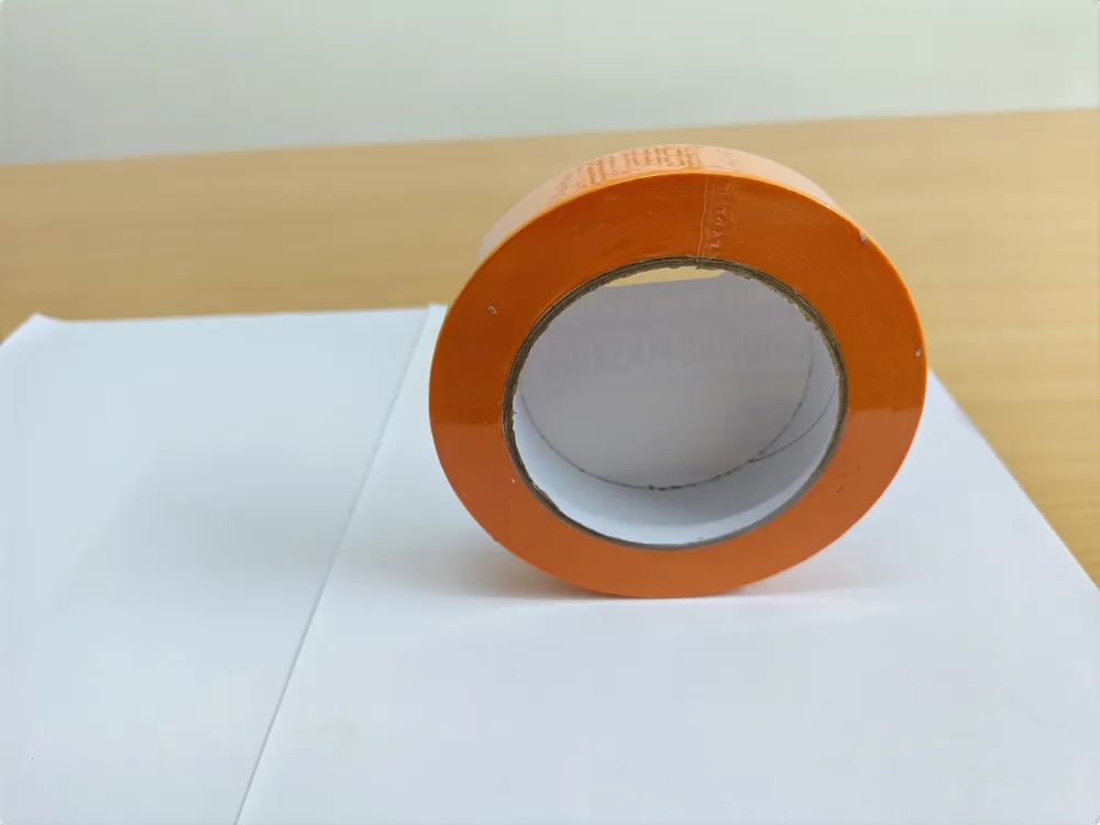 Roll of Maasktape Orange masking tape, 24 mm by 50 m.
